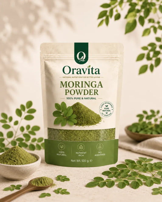 Oravita Green Rise – Pure Moringa Leaf Powder in a 120g pouch, surrounded by fresh moringa leaves and powder. 100% natural.